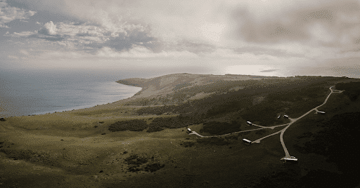 Aerial view of CABN’s off-grid cabins for rent, dotted along the Kangaroo Island coastline