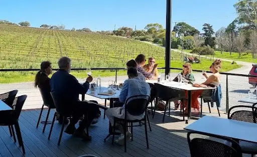 winery accommodation mclaren vale at oliver’s taranga vineyards with guests dining and vineyard views